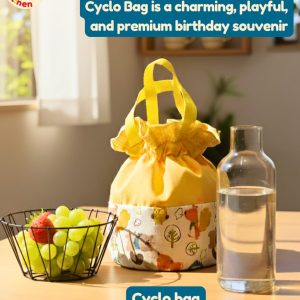 Cyclo Bag Onnellinen berwarna kuning serut dengan motif katun halus, ideal sebagai souvenir ulang tahun premium atau tas bekal