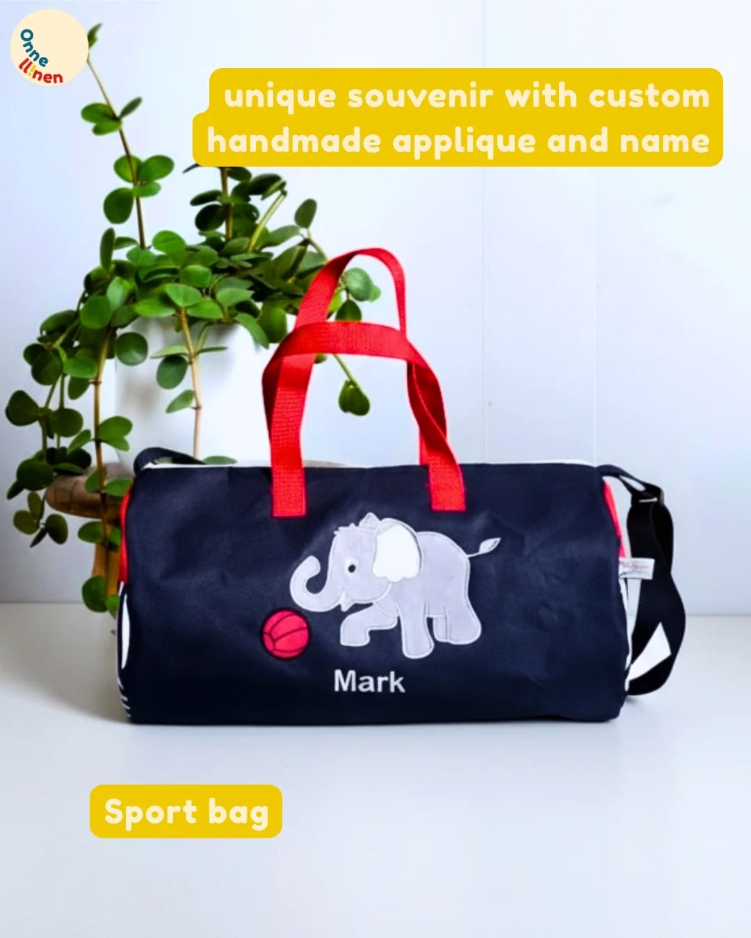 Sport Bag tabung custom dongker (biru tua) aplikasi gajah bermain bola dengan bordir nama Erica, souvenir anak aktif.