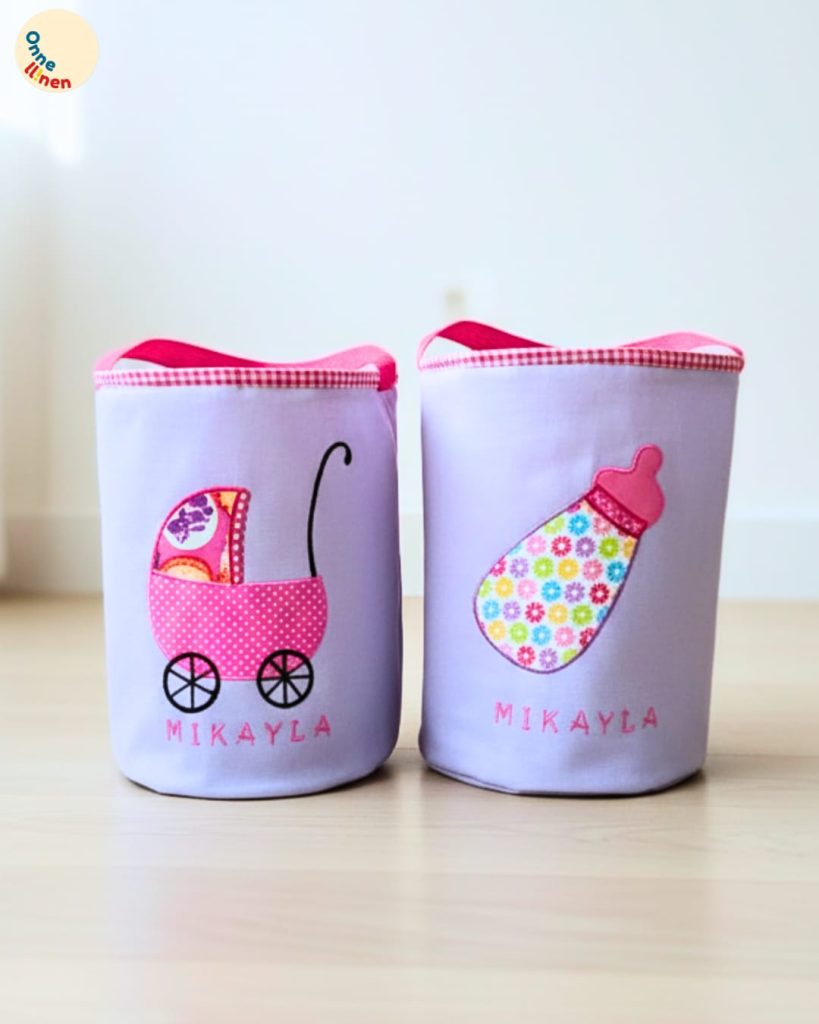 Lunch bag tabung souvenir bayi custom tema stroller pink dan botol susu bunga.